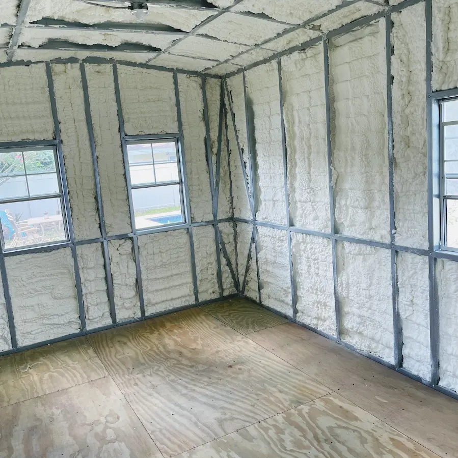Closed-cell spray foam insulation applied to wall cavities in a residential project in Creedmoor