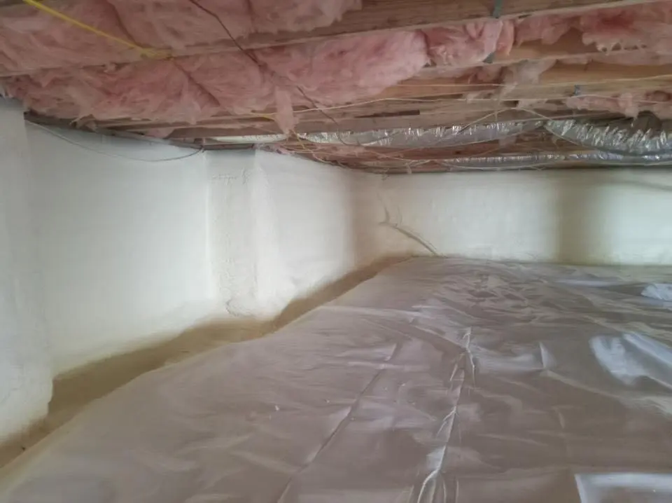 Crawl space encapsulation with closed-cell spray foam for Commercial Roof Restoration in Creedmoor